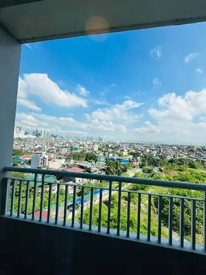 a view of the city from a balcony at 1 Bedroom with balcony Near Airport Bgc Taguig City in Manila