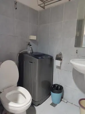 a bathroom with a toilet and a sink at 5 Years Legit Staycation Infront Of Moa, Sea Residences Tower A, Near Smx, Arena, Dfa, World Trade, PICC, AYALA MALL, NAIA in Manila