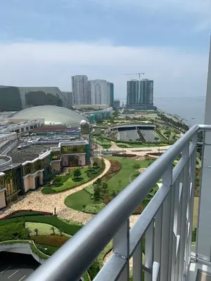 a view of a city from the balcony of a building at Le Maisse Executive Studio 1BR opp Okada in Manila