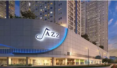 a building with aaa sign on the side of it at Ronnzel staycation in Jazz Residence Makati in Manila