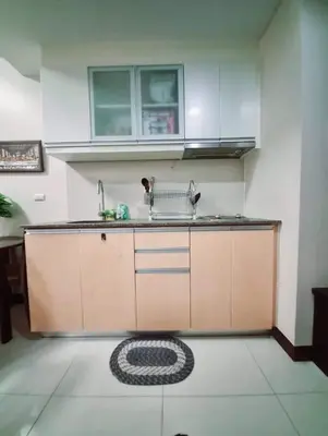 a kitchen with a sink and a counter top at 101 condo furnished walking distance NIAA 3 in Manila
