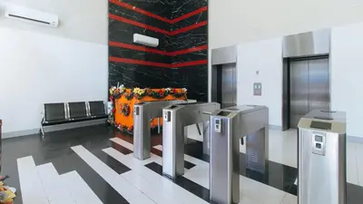 a lobby with a fireplace in a building at RedDoorz Plus near Nakpil St Taft Avenue in Manila