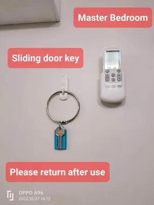 a key chain and a cell phone on a wall at #30 Bel Air House by Red Door House Rental in Santa Rosa