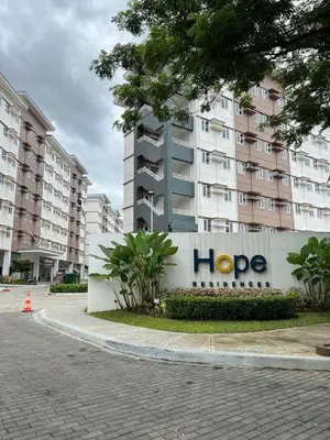 a large building with the word hope written on it at Staycation ni Inday in Trece Martires
