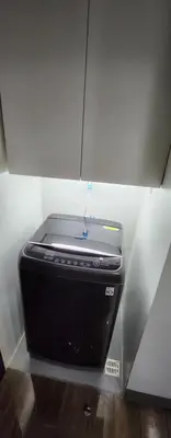 a black appliance sitting in a corner of a room at SMDC AIR RESIDENCES in Manila