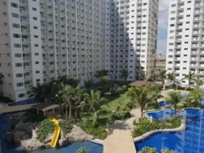 a view of a resort with a water park at SHORE RESIDENCE D9 Shortwalk Mall of Asia Near Airport in Manila