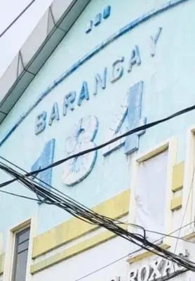 a sign on the side of a building at THE MANSION: FAMILY AND BARKADA BONDING PLACE IN PASAY NEAR AIRPORT in Manila