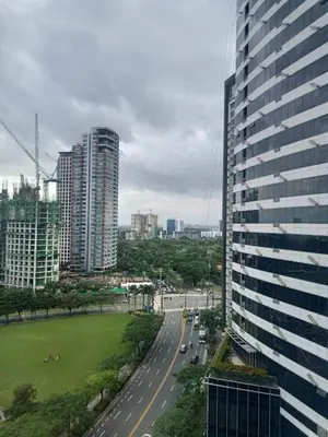 a view of a city from a building at Fort Victoria Condominium Tower C in Manila
