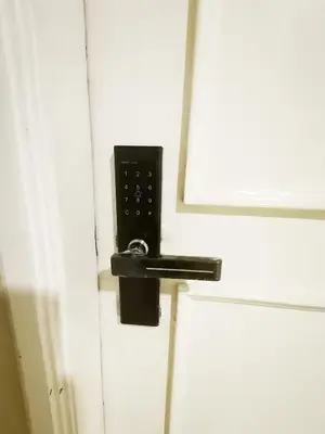 a door with a lock on it with a window at Accommodation Service in Manila
