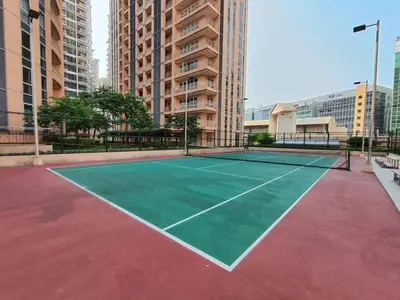 a tennis court in the middle of a city at A2J Luxury Studio Near Venice Mall BGC Taguig in Manila
