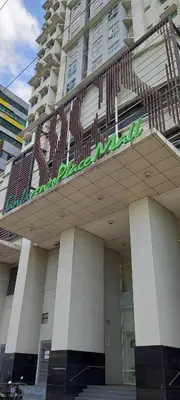 a building with a sign on top of it at SLP Montecillo in Manila