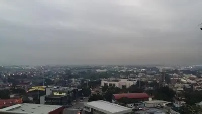 an aerial view of a city with buildings at Rochester Condo in Manila