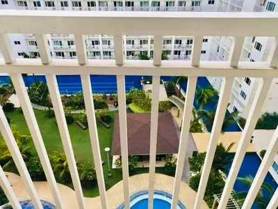 arial view of the balcony of a condo building at Shore Residence D10 Near Mall Of Asia- Airport in Manila