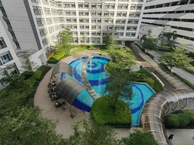 an overhead view of a swimming pool in a building at Crib's nr.BGC in Manila