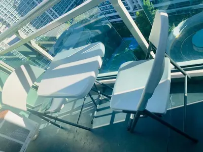 two chairs sitting on top of a bus at Azure Urban Residence A10 Near Airport and SM Bicutan+ Free wifi in Manila