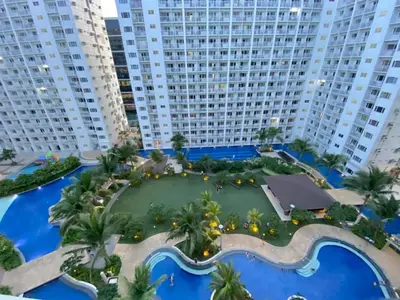 an aerial view of a resort with tall buildings at Shore Residences MOA Complex Staycation in Manila