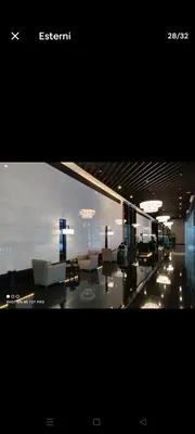 a living room with couches and chairs in a room at Amazing view Makati Elegant flat 400MB internet in Manila