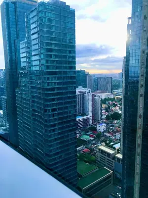a view of a city with tall buildings at Daniella’s Modern & Cozy Suite in Uptown BGC in Manila