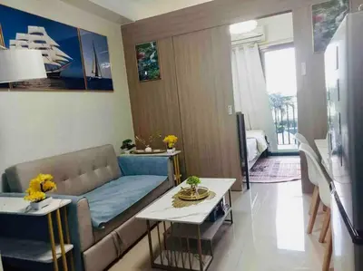Gallery image of MALL Of ASIA-P00L Fr0nt- NEW 1 BR Condo with Balc0ny at Sh0re2 in Manila