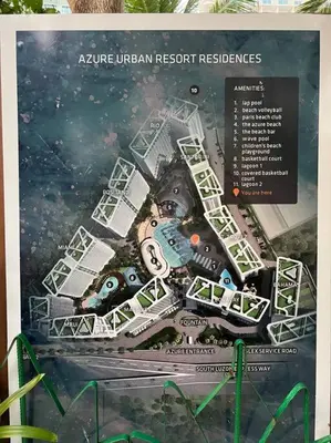 a poster for an urban resort with a city at Scr AzureINetflixIBalconyIGames in Manila