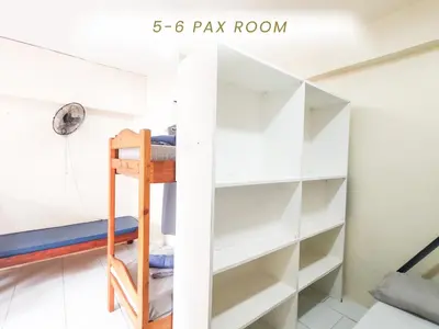 a room with a bunk bed and a ladder in a room at Cenco Suites Residences - Transient in Tanza Cavite in Tanza
