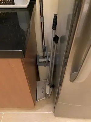 a bathroom door with a trash can next to a door at Spacious condo in Venice Luxury Residences in Manila