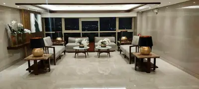 a living room with couches and tables and windows at Coast Residence 4026 PENTHOUSE 1 Bedroom Condo with Wifi & Netflix in Manila