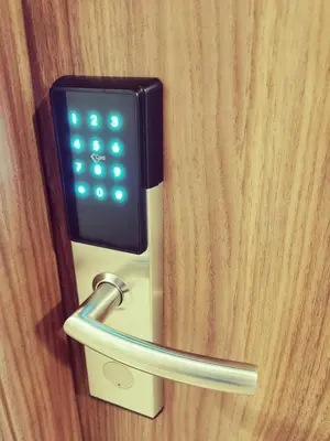 a close up of a door with an alarm clock on it at Condominium at Spring Residences near Airport in Manila