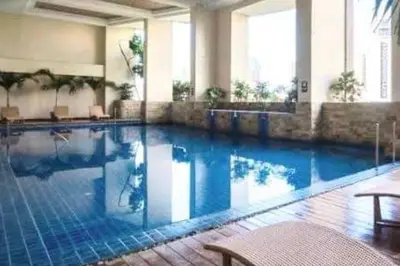 a large swimming pool in a hotel room at KL Tower Makati near AIM, Greenbelt 90mbps WIFI in Manila