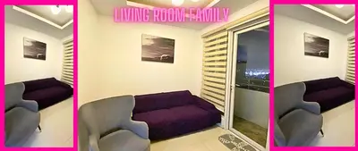 a living room with a purple couch and a window at Family Room Affordable, Cheapest Deluxe Double Unit in Manila with 2 Balconies & 2 Bathrooms 25 Percent Discount, Free Sauna & Pool Access Near Manila Bay, Robinsons Place Ermita, Pgh, Bellagio, UP, Pedrogil, US Embassy, NAIA Airport Updated 2024 in Manila